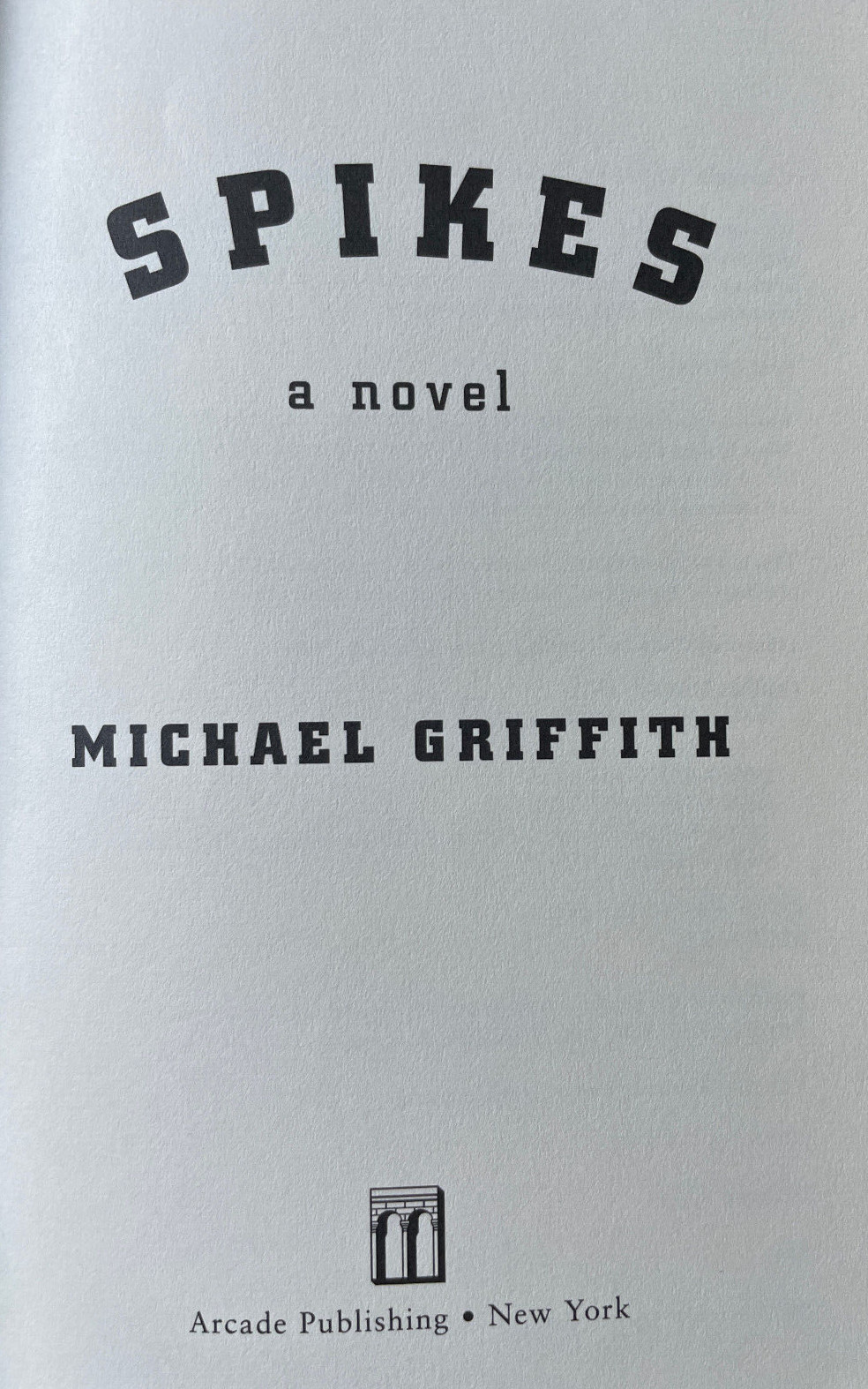Spikes : a novel / Michael Griffith (Arcade Publishing 2001 trade paperback)