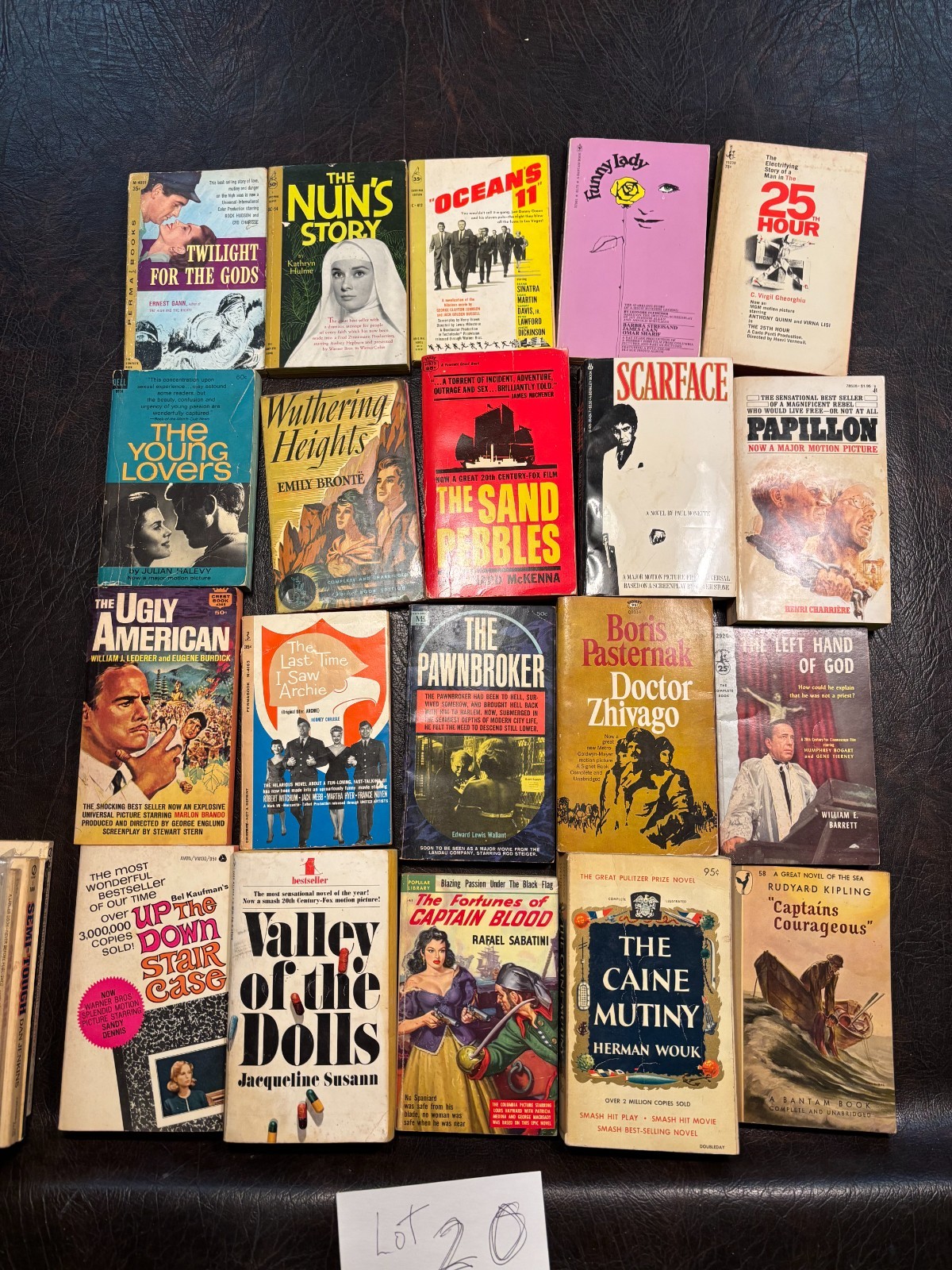 Lot 20 – Twenty Movie tie-in paperbacks average VG 1940s-2000s see photos
